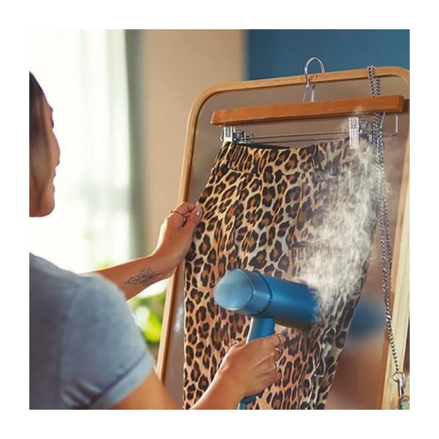 Philips Serie 3000 Plancha vertical - Vaporizador - 1000 W, 20 g/min de vapor, Depósito de agua de 100 ml extraíble, Placa de plástico, Diseño compacto y plegable ideal para viajar, Azul (STH3000/20)